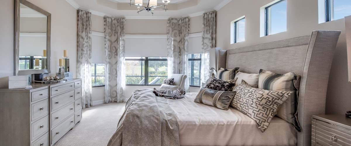 Many luxuries such as chandelier, coffered ceiling and reading nook in master bedroom